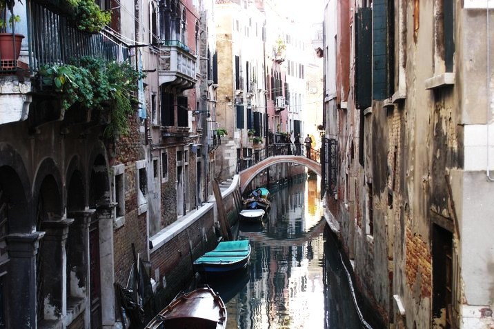 Venice small canal with gondola